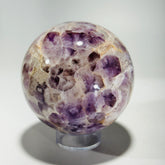 Amethyst sphere in acrylic stand